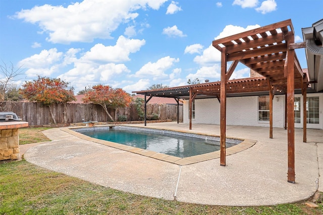 view of pool with a patio and a pergola