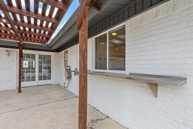 view of patio featuring a pergola