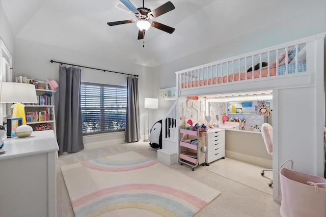 carpeted bedroom featuring vaulted ceiling and ceiling fan