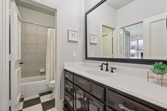 full bathroom with shower / tub combo with curtain, vanity, and toilet