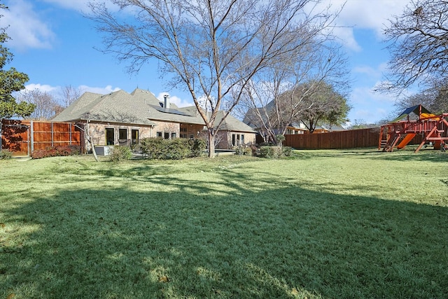 view of yard with a playground