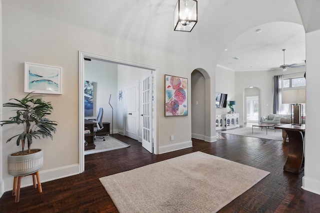 entryway featuring dark hardwood / wood-style floors and ceiling fan