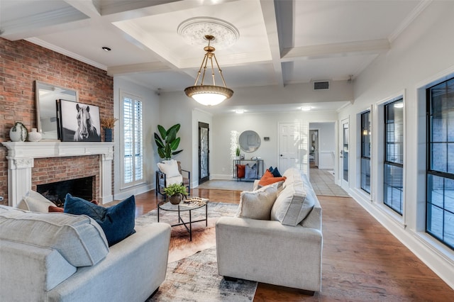 living room with wood-type flooring, beam ceiling, and coffered ceiling