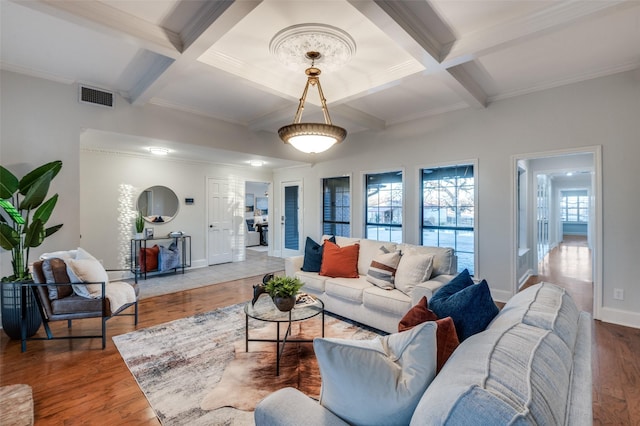 living room with wood-type flooring, coffered ceiling, and beamed ceiling