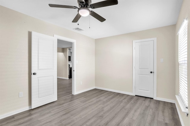 unfurnished room featuring light hardwood / wood-style flooring