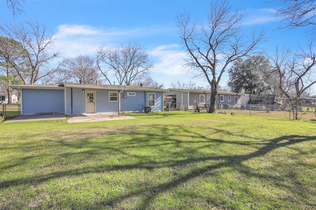 exterior space with a patio area and a front yard