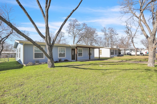 view of front of house with a front lawn