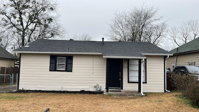 view of front of property with a front lawn