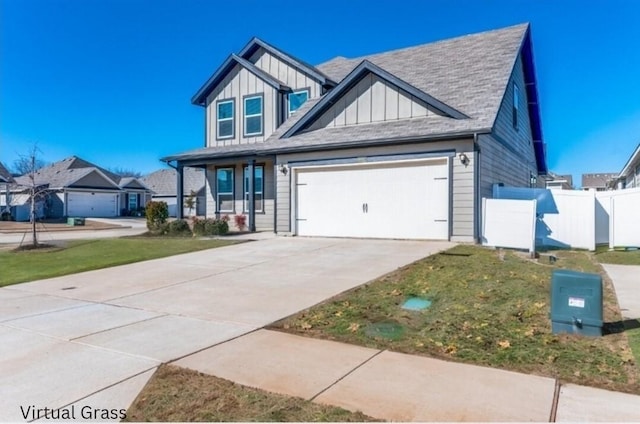 view of front of property featuring a garage and a porch