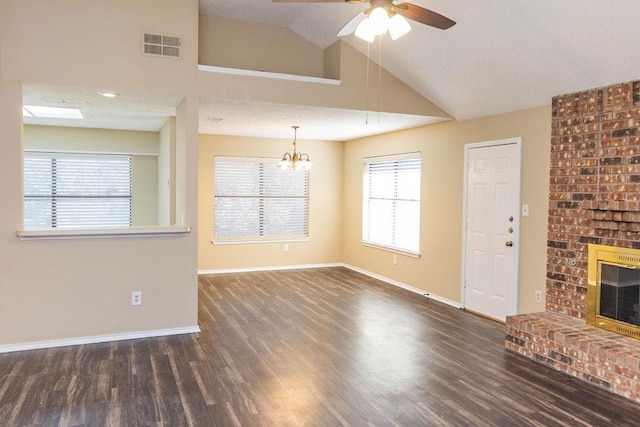 unfurnished living room with a brick fireplace, dark wood-type flooring, ceiling fan, and vaulted ceiling