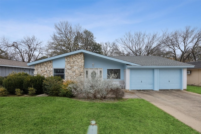 single story home with a garage and a front yard