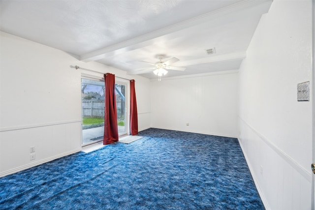 carpeted empty room featuring beamed ceiling and ceiling fan