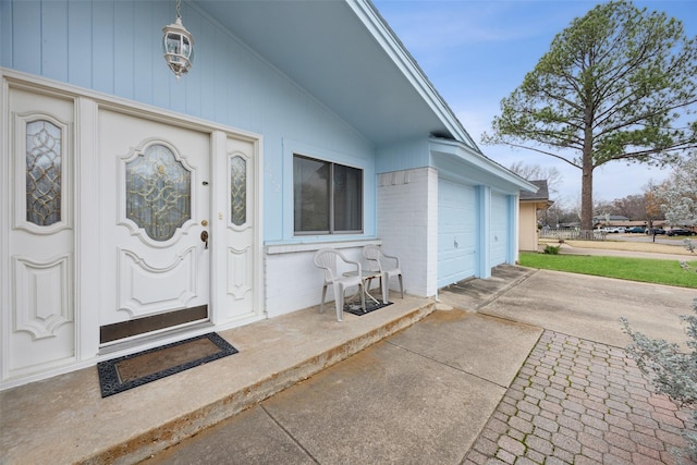 property entrance with a garage