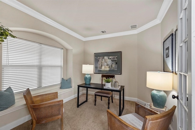 home office featuring light colored carpet and crown molding