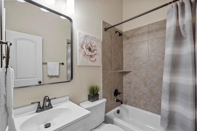 full bathroom with toilet, vanity, and shower / tub combo with curtain