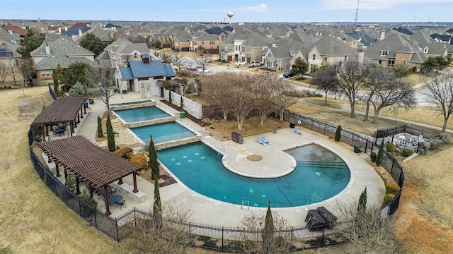 view of pool with an in ground hot tub and a patio