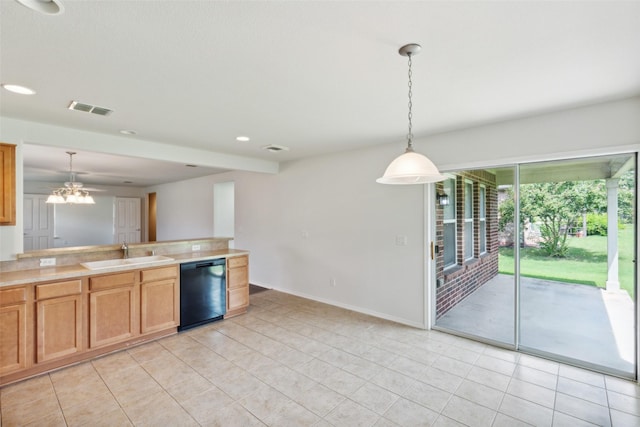 kitchen with sink, light tile patterned floors, decorative light fixtures, and black dishwasher