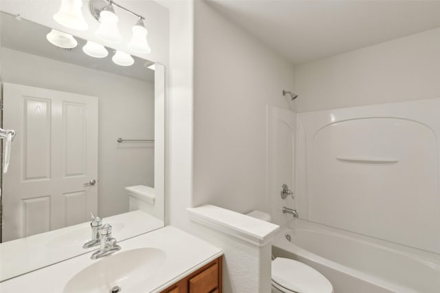 full bathroom with vanity, bathing tub / shower combination, and toilet