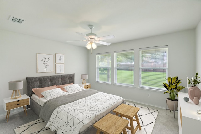 carpeted bedroom featuring ceiling fan