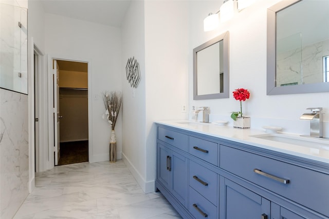 bathroom with a shower and vanity