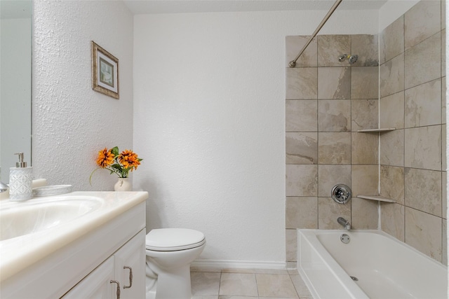 full bathroom with toilet, tiled shower / bath, tile patterned floors, and vanity