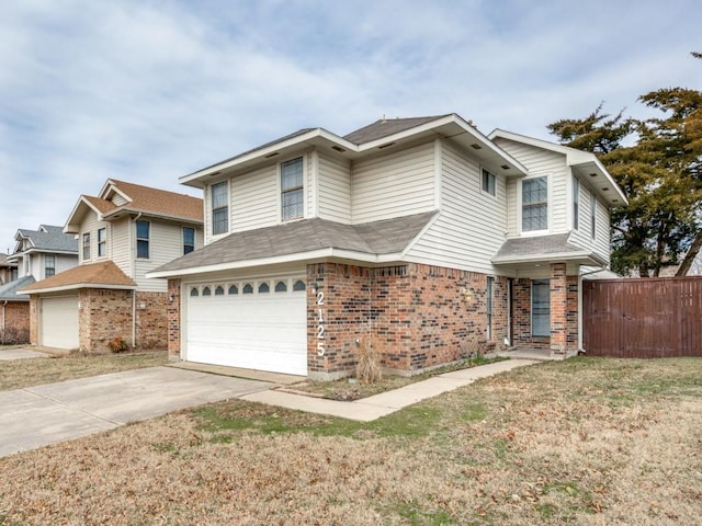 front of property featuring a garage and a front yard