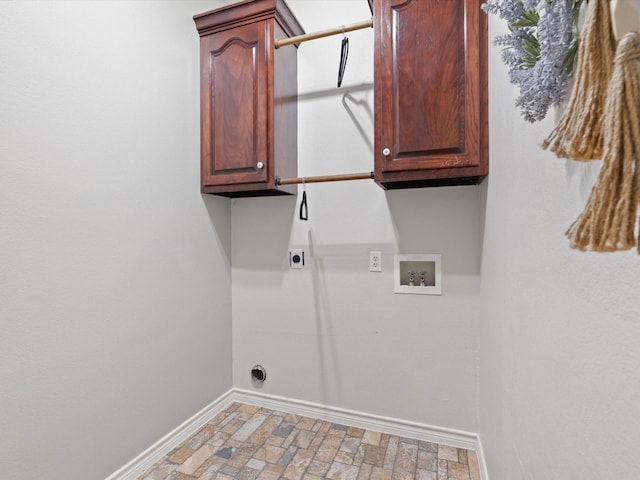 laundry area featuring hookup for a washing machine, cabinets, and hookup for an electric dryer