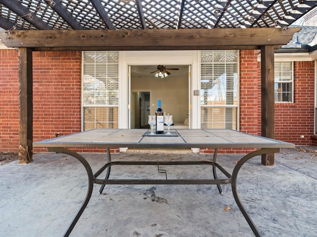 view of patio featuring a pergola