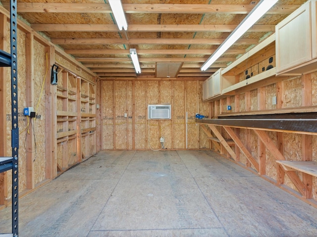 storage room with an AC wall unit