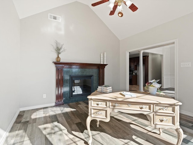 office featuring vaulted ceiling, ceiling fan, and dark hardwood / wood-style flooring