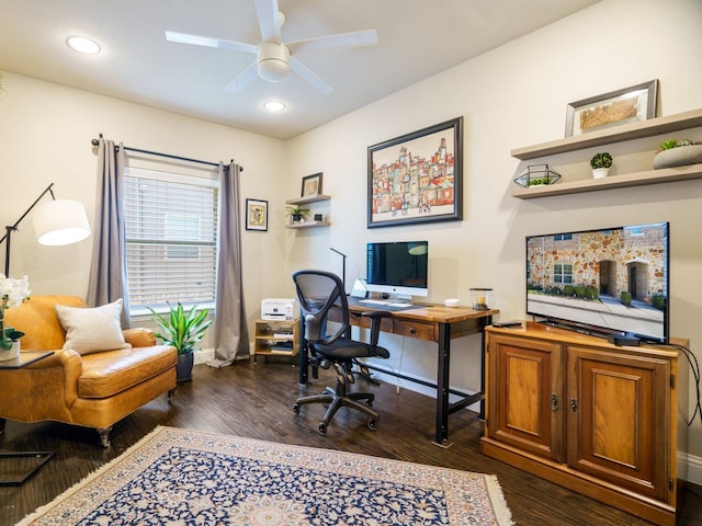 office with dark hardwood / wood-style flooring and ceiling fan