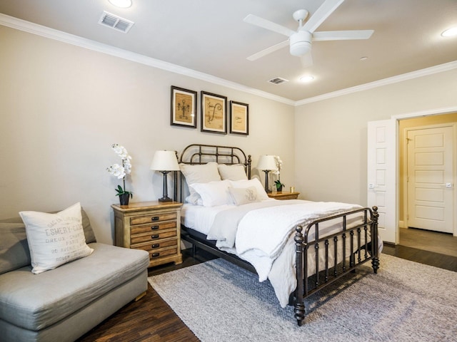 bedroom with ceiling fan, dark wood-type flooring, and ornamental molding