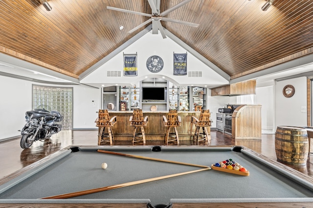 game room featuring wooden ceiling, built in features, high vaulted ceiling, and bar