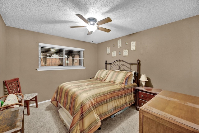 bedroom with a textured ceiling, a ceiling fan, baseboards, and light carpet