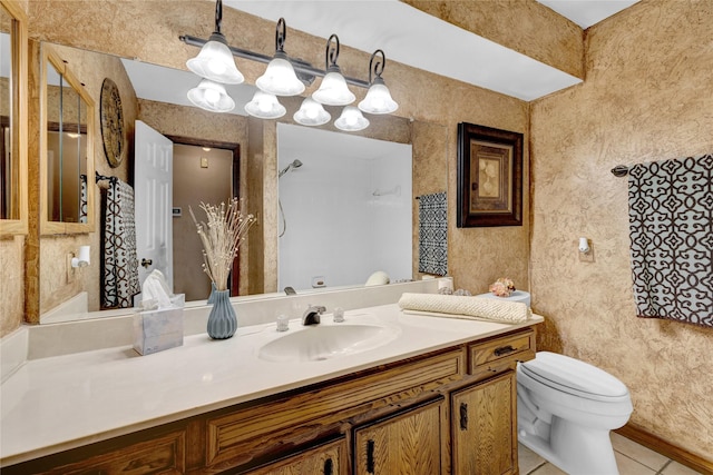 bathroom featuring tile patterned floors, a shower, toilet, and vanity