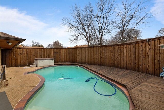 view of pool featuring a fenced in pool and a fenced backyard