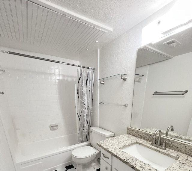 full bathroom with vanity, toilet, a textured ceiling, and shower / bath combo