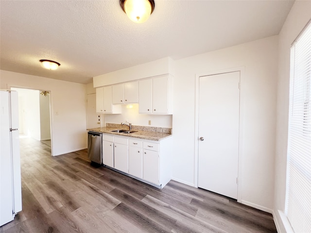 kitchen with sink, white cabinetry, wood-type flooring, dishwasher, and white fridge