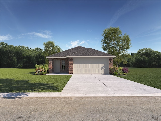 view of front of property featuring a garage and a front lawn