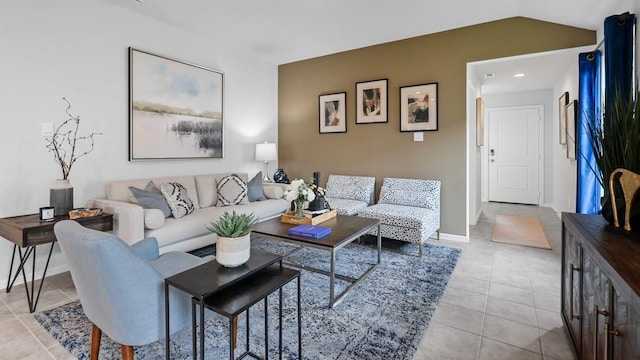 tiled living room featuring lofted ceiling