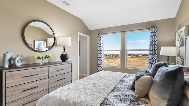 bedroom featuring lofted ceiling