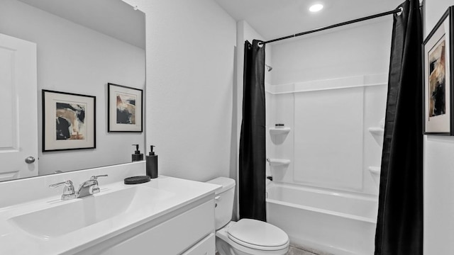 full bathroom with toilet, vanity, and shower / tub combo with curtain