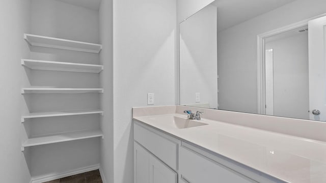 bathroom with vanity and tile patterned floors