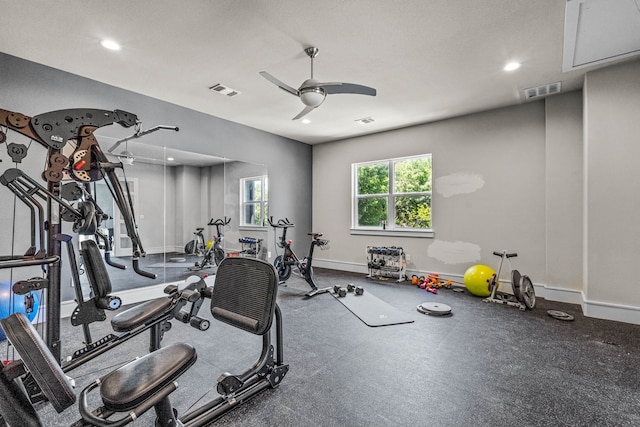 workout room featuring ceiling fan