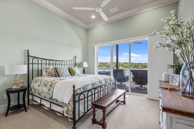 bedroom featuring ceiling fan, light colored carpet, crown molding, and access to outside