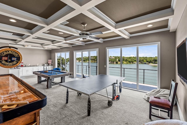 recreation room featuring coffered ceiling, beam ceiling, carpet floors, and crown molding