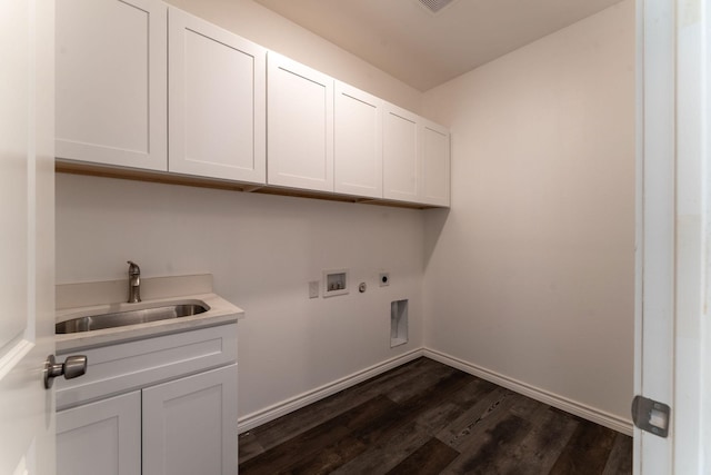 laundry area featuring sink, hookup for a washing machine, hookup for an electric dryer, cabinets, and dark hardwood / wood-style floors