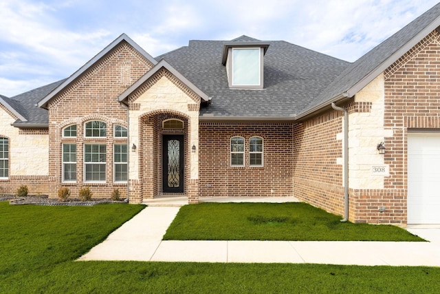 view of front of house with a front lawn