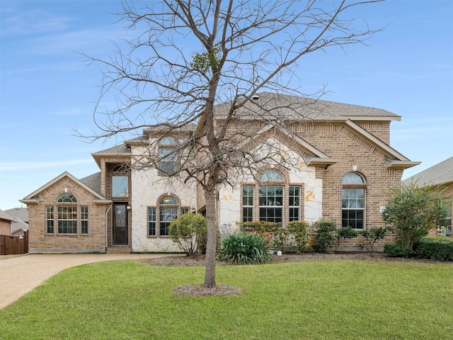 view of property with a front lawn