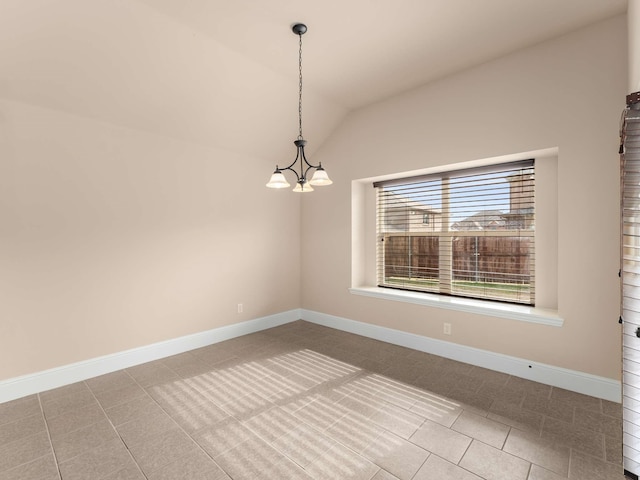 tiled empty room with lofted ceiling and an inviting chandelier